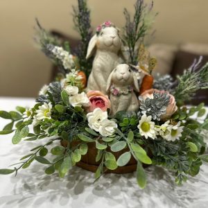 Handmade Easter bunny centerpiece with spring florals and greenery