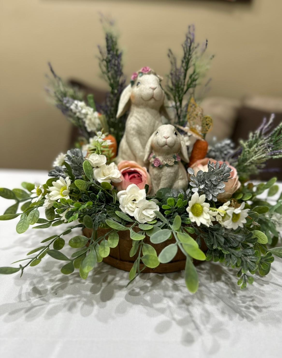 Handmade Easter bunny centerpiece with spring florals and greenery